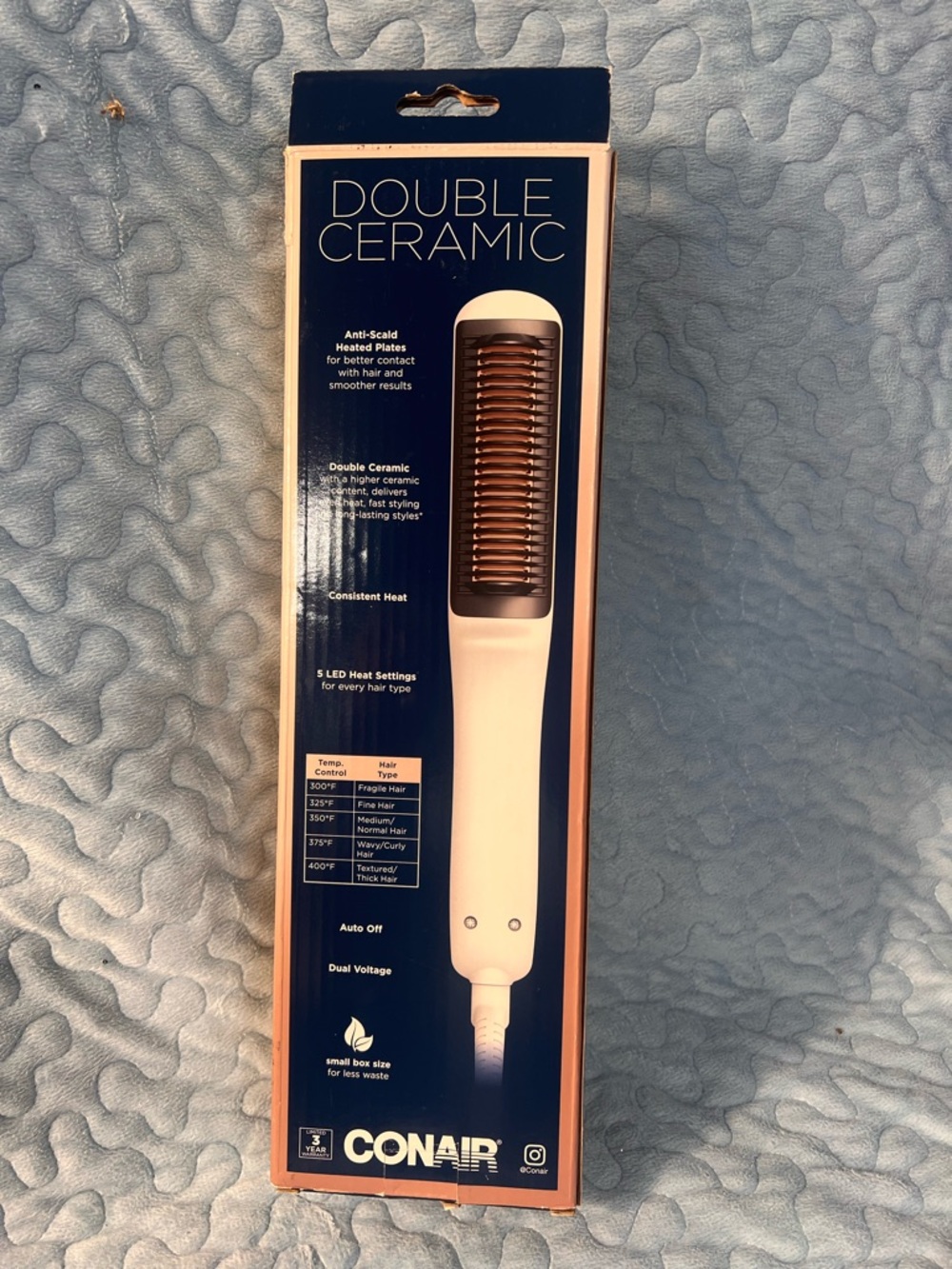 Double ceramic heated straight brush.